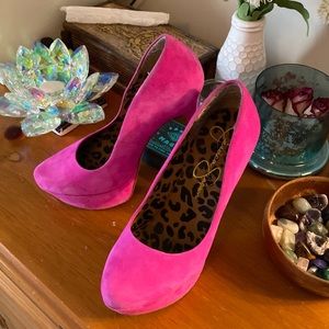 Hot pink platform pumps